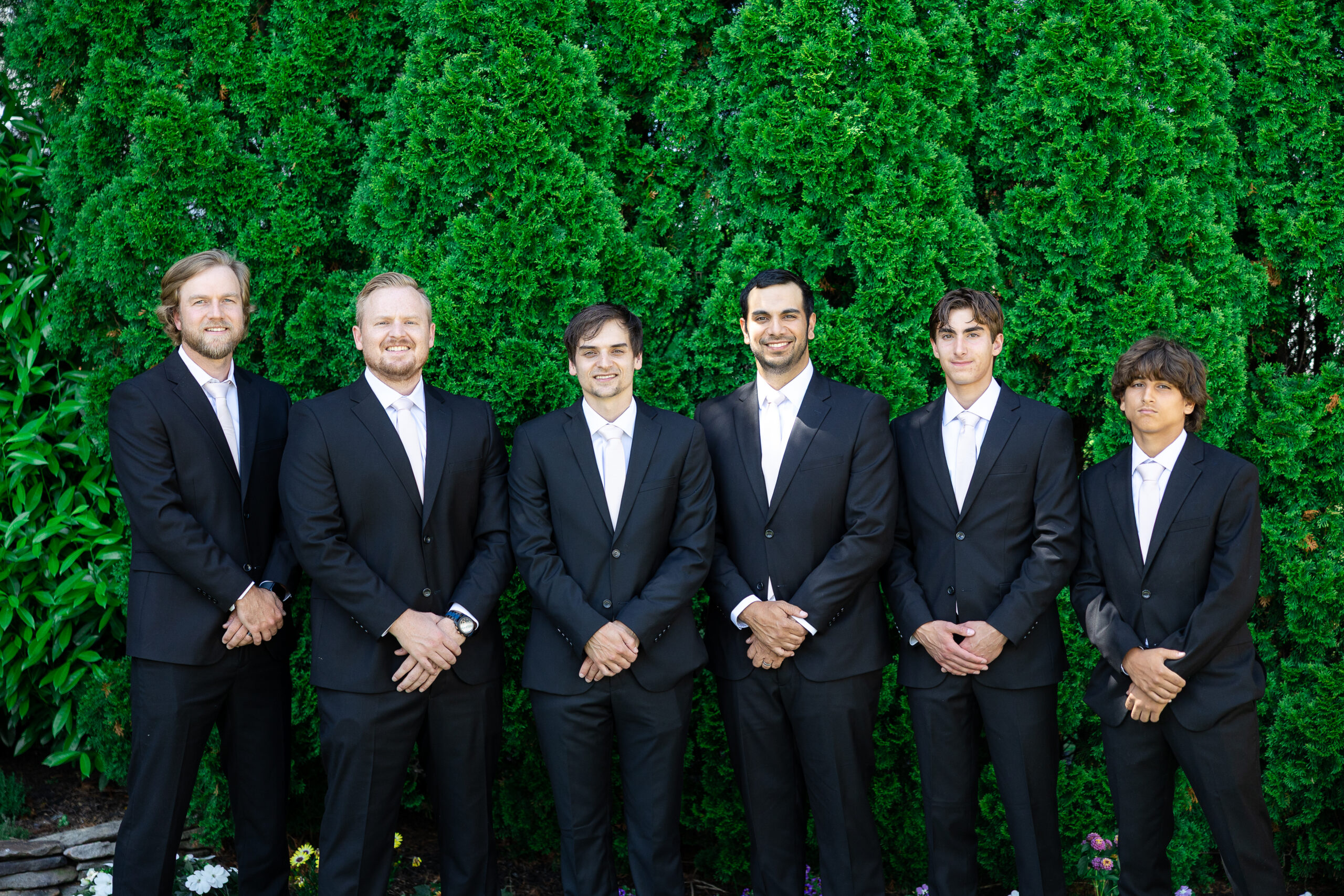 Groomsmen wedding party at beach wedding day