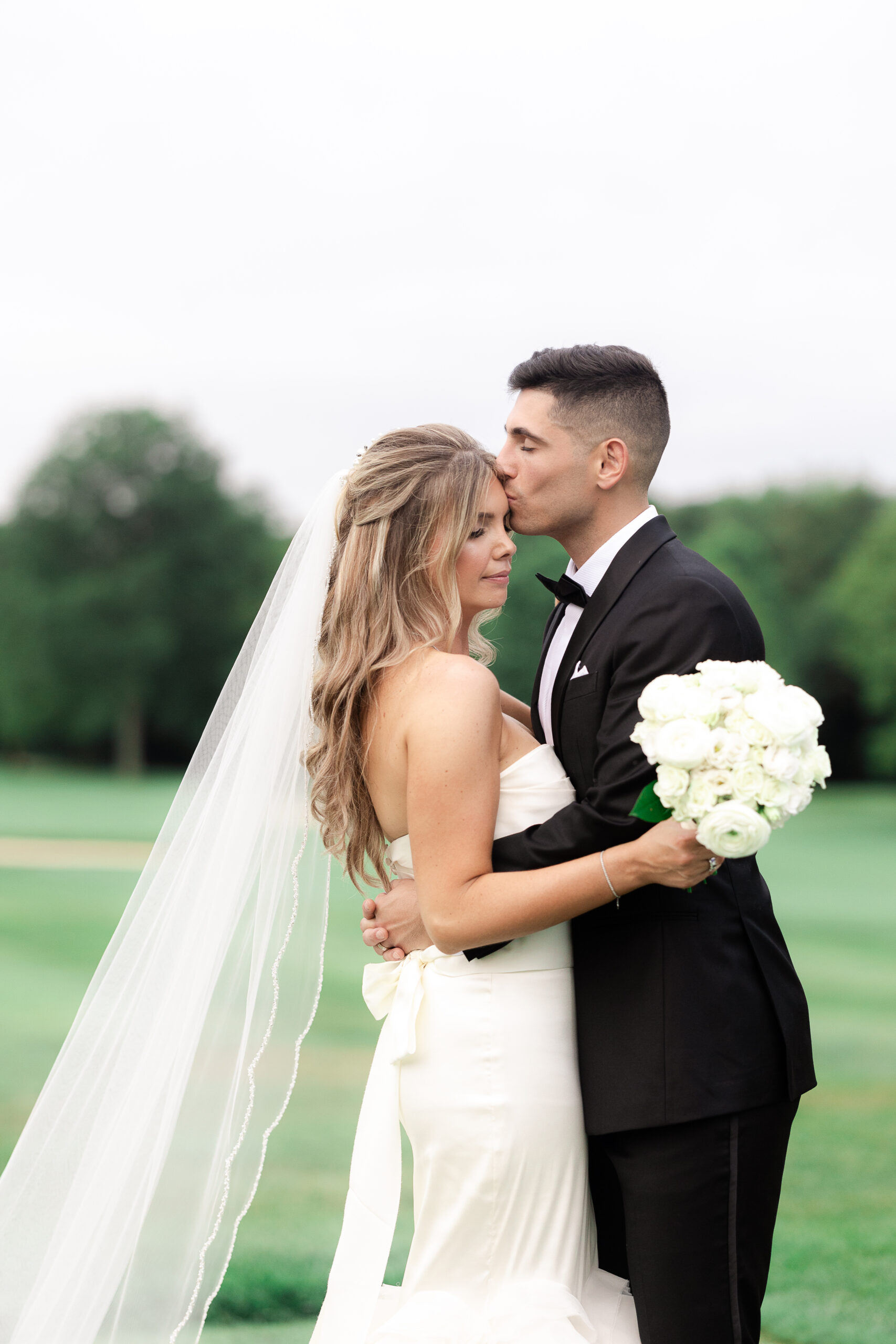 Romantic summer wedding portraits of bride and groom