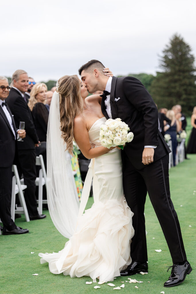 Bride and groom at outdoor country club wedding ceremony