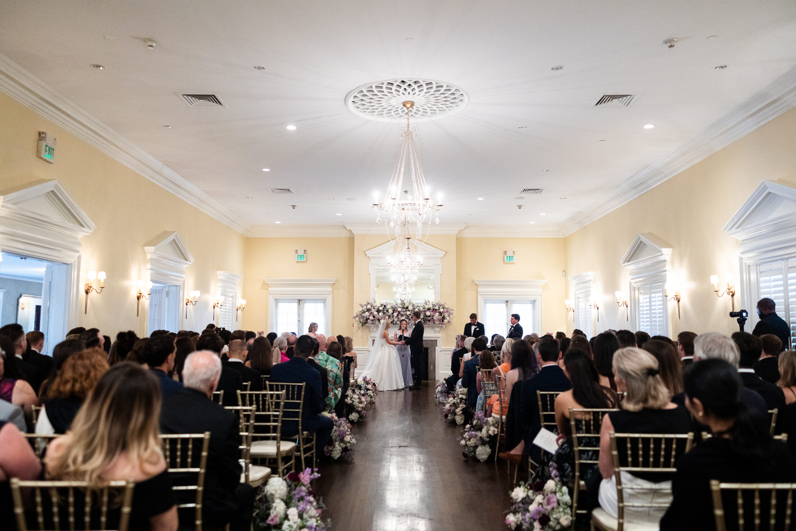 Indoor wedding ceremony at Heritage Club