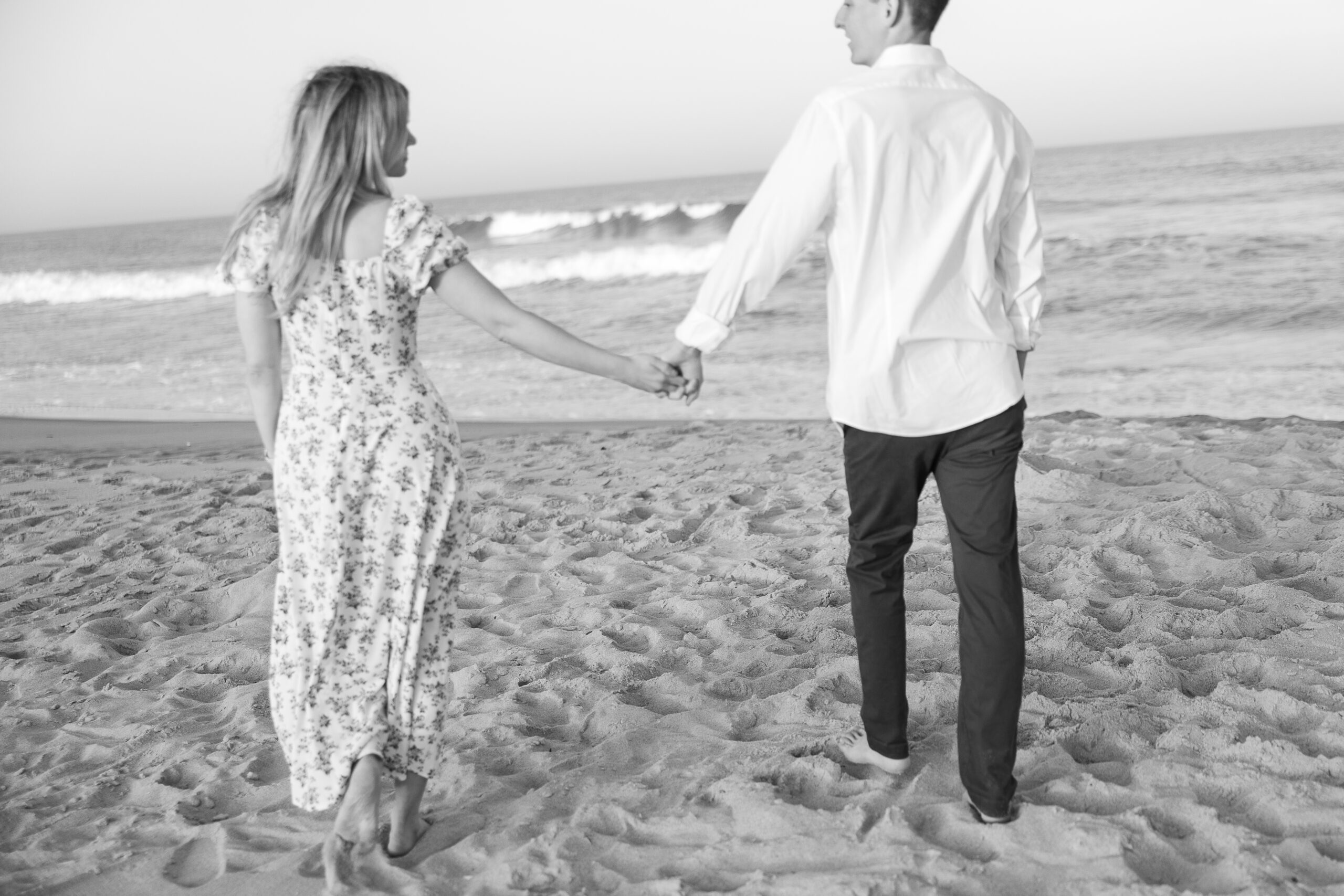 Fun beach engagement portraits at Spring Lake Beach